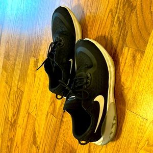 Boys youth black Nikes running shoes. 7Y